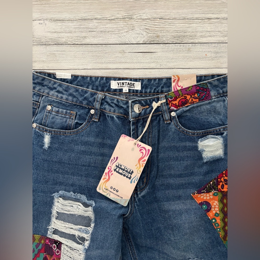 Almost Famous Vintage Blue patch work distress flare jeans